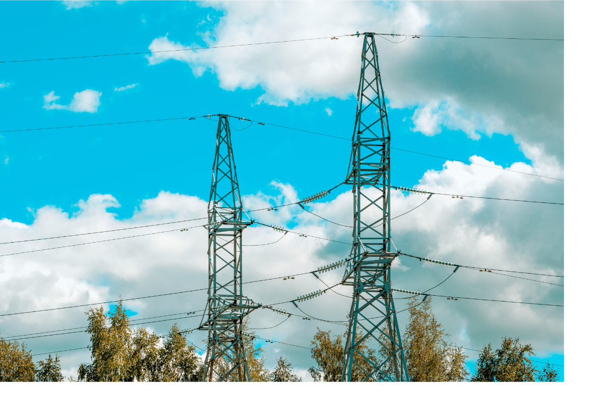 Electric towers with blue skies and white clouds